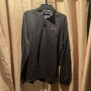 Loose grey under armor pullover